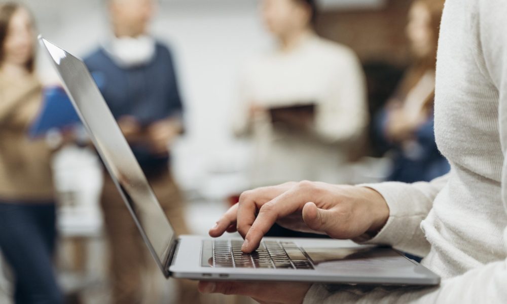 man-working-laptop-while-standing